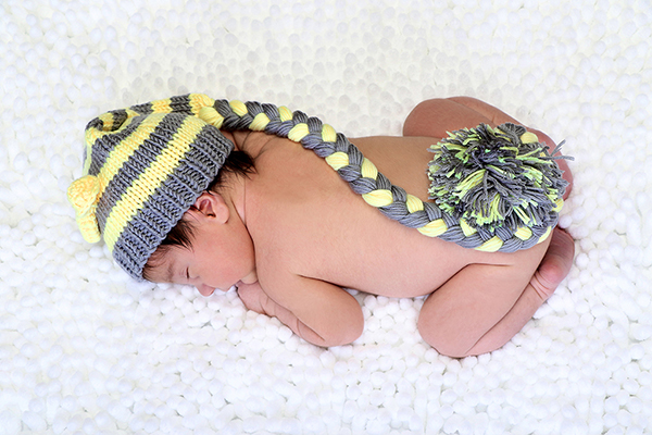 Sur une couverture se trouve un joli bébé. Photographie : Richard et Rachel Joubi